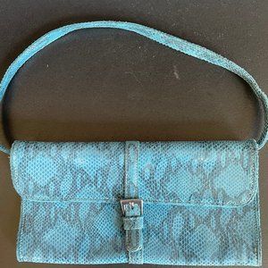 BEBE turquoise fake snakeskin embossed clutch